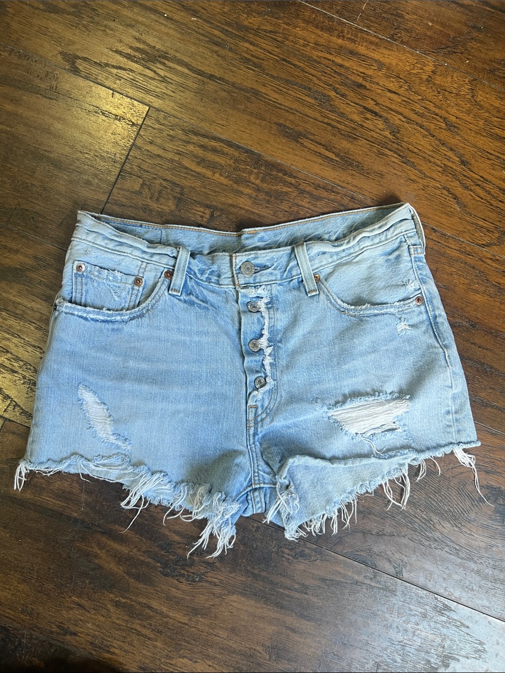 Levi’s 501 woman’s frayed denim shorts button-fly size 29